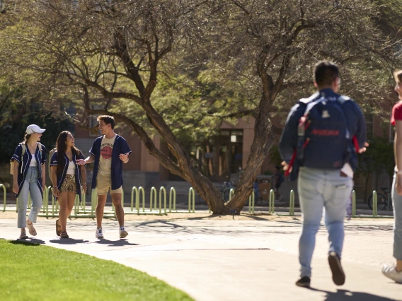 group of students walking on campus