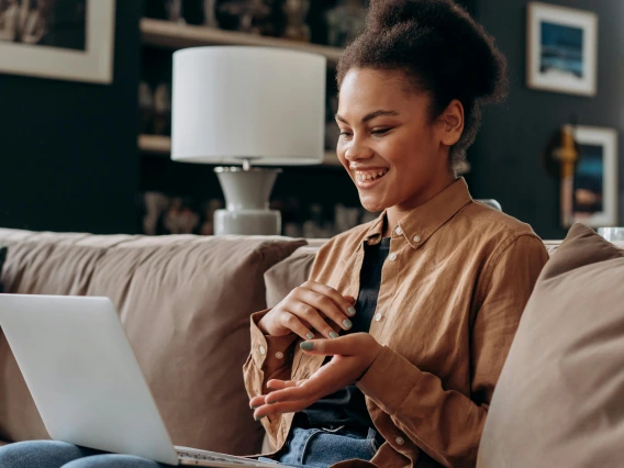 person using a laptop for a video meeting