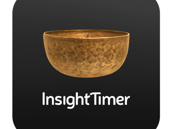 insight timer app gold meditation bowl on black background