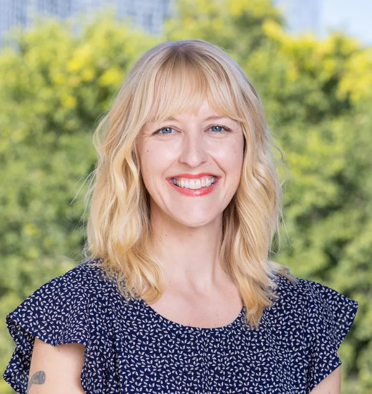 Portrait of a person with trees in the background.